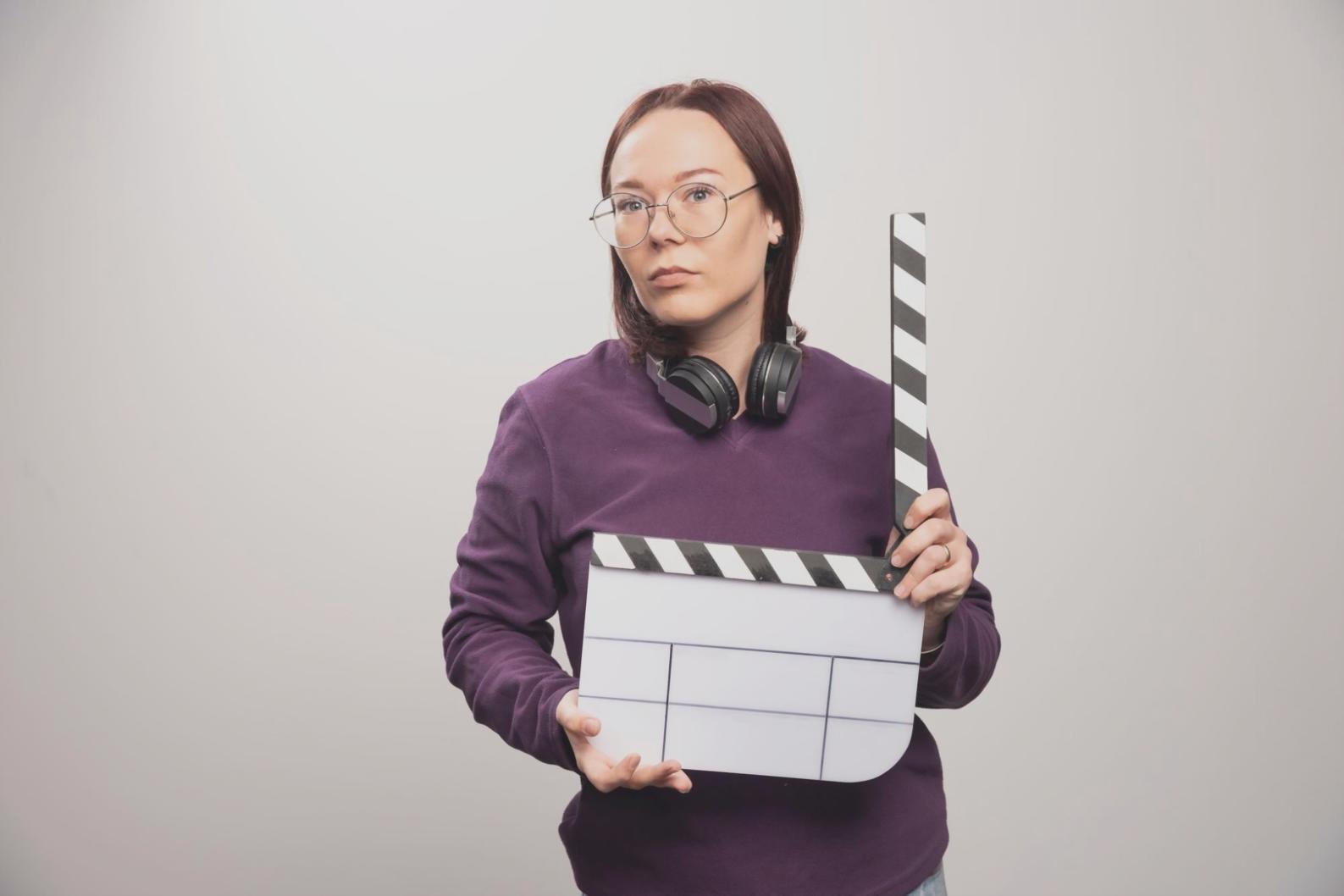 Students performing scene work in professional theater setting